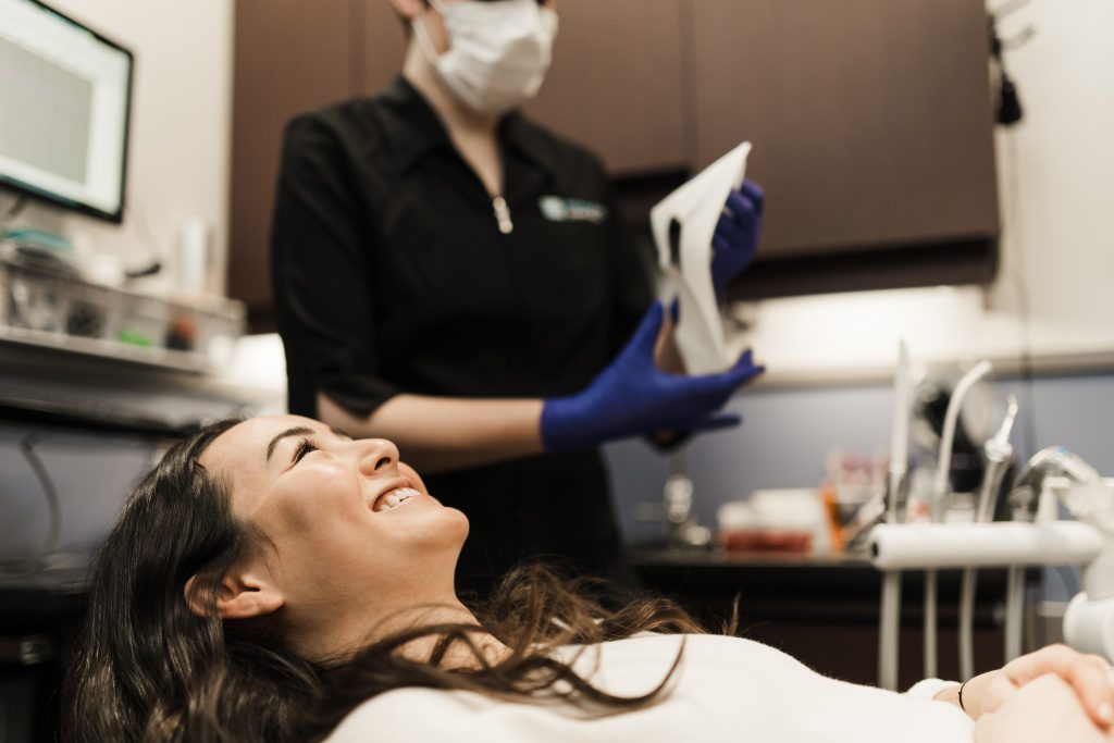 Preparing a patient for dental hygiene at Oak Street Dental in Victoria, BC